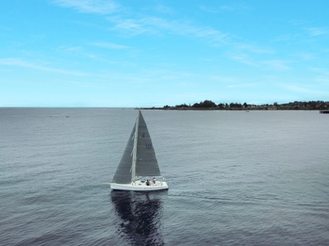 Photo of the Pegasus Racing J-E100 — Main and Jib sailing port tack